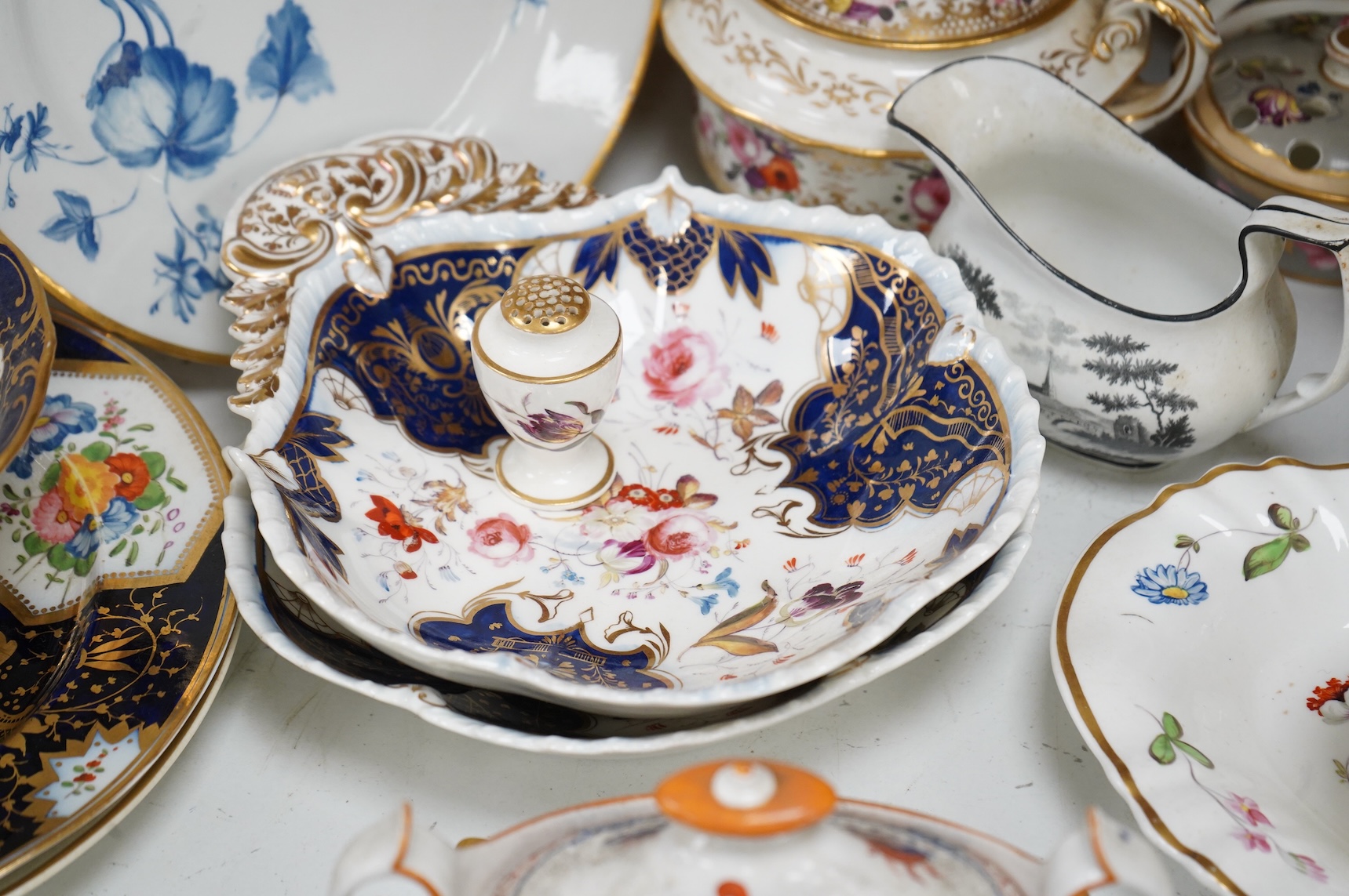 A collection of early 19th century English porcelain tea, dessert and dinner wares including Derby dessert plates, Bloor Derby, Barr Flight & Barr plate, Spode, Coalport etc.